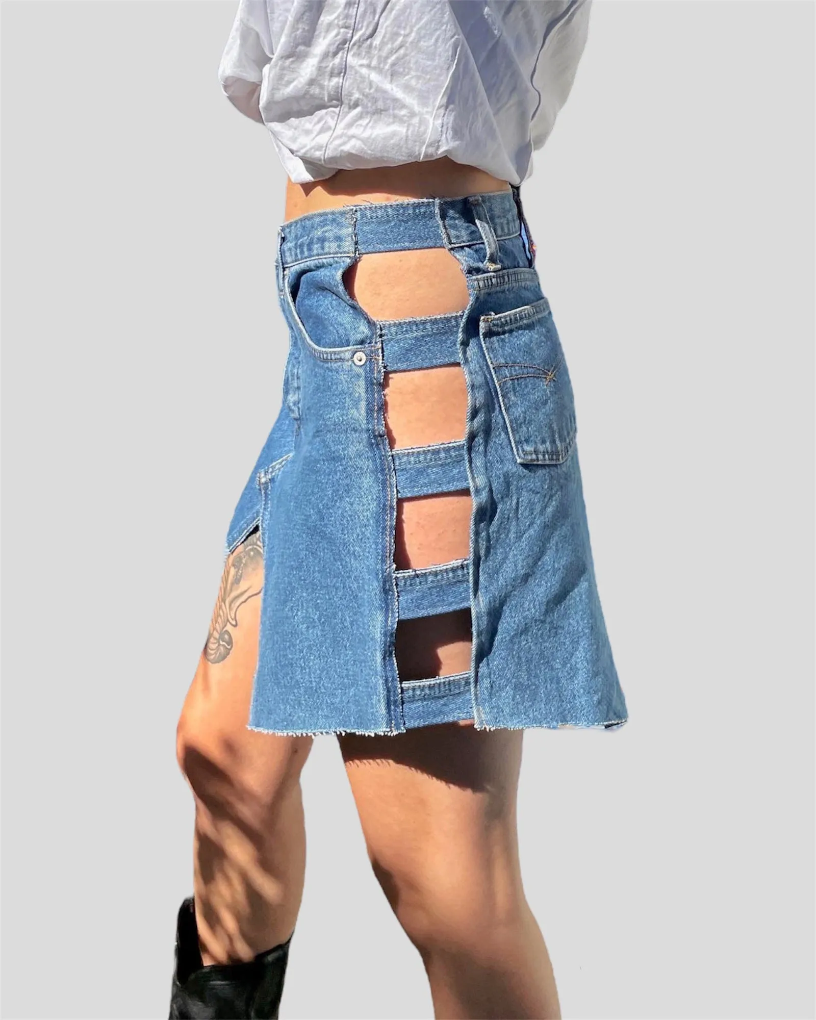 ASYMMETRICAL DENIM MINI SKIRT