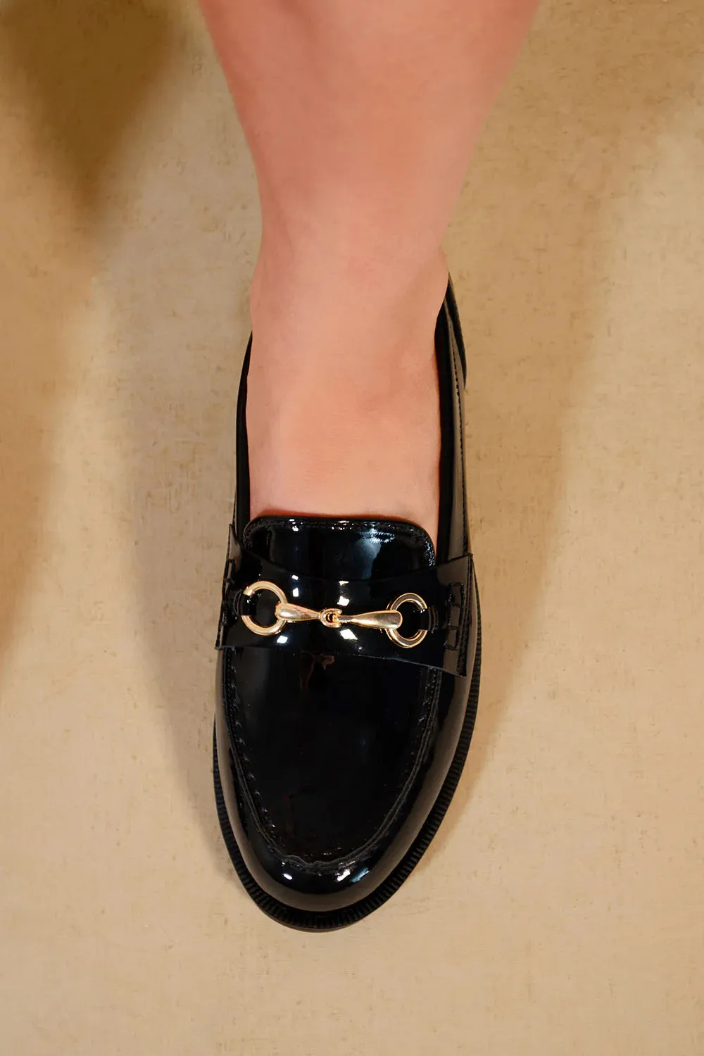 CIELO WIDE FIT ROUND TOE SINGLE METAL BAR LOAFERS IN BLACK PATENT