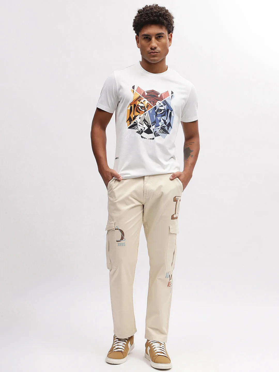 Iconic Men Beige Solid Relaxed Fit Trouser