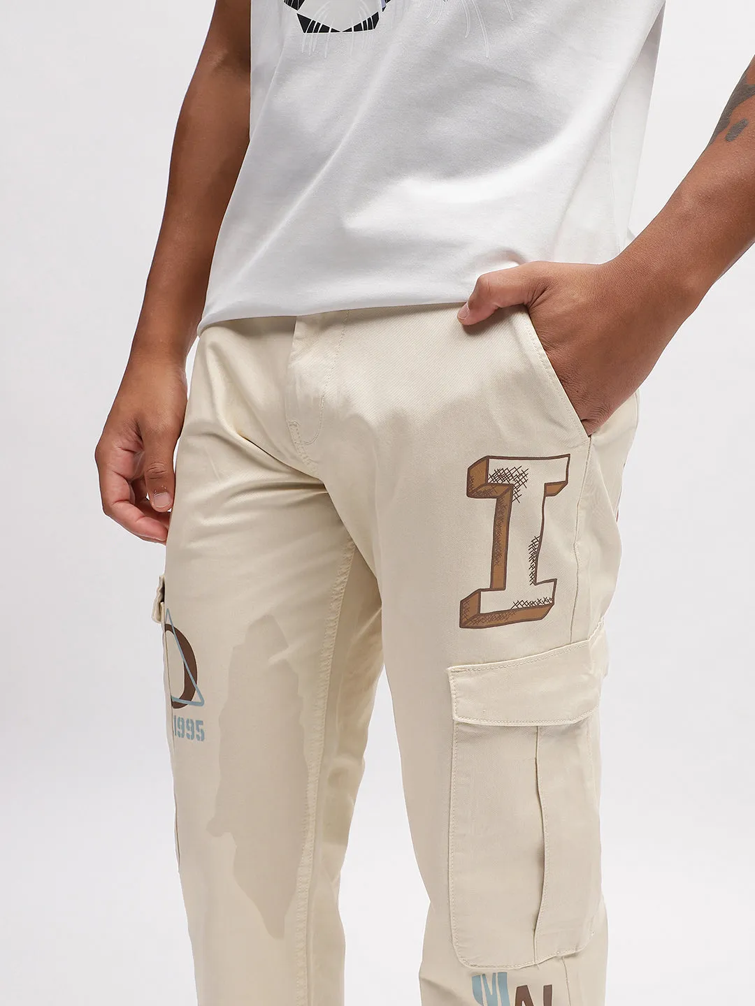 Iconic Men Beige Solid Relaxed Fit Trouser